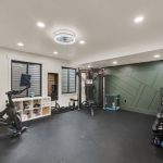modern-gym-room-black-floor-equipment